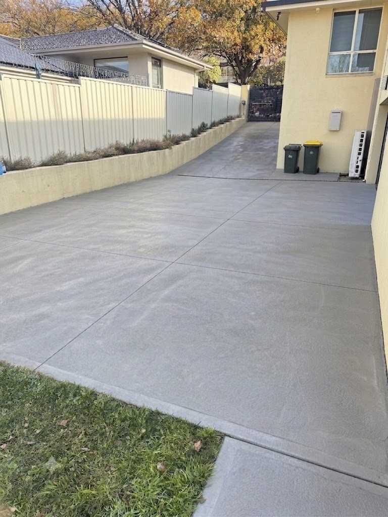 Driveway & Concrete Cleaning — filthy vs restored exposed-aggregate driveway